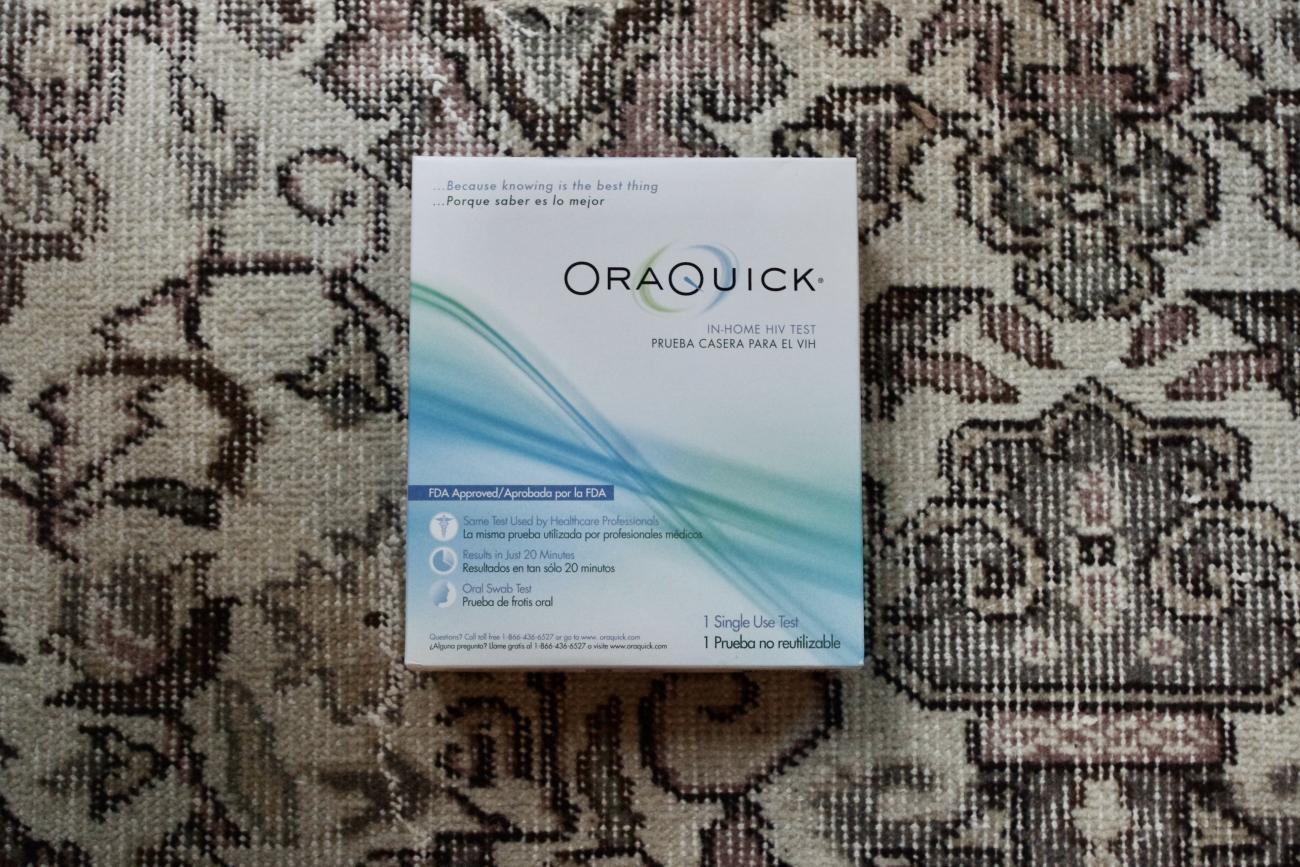 OraQuick In-Home HIV Test in box on top of Turkish rug