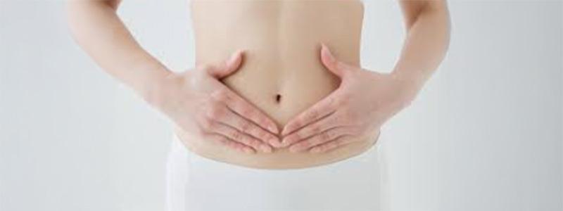A person holding their stomach.